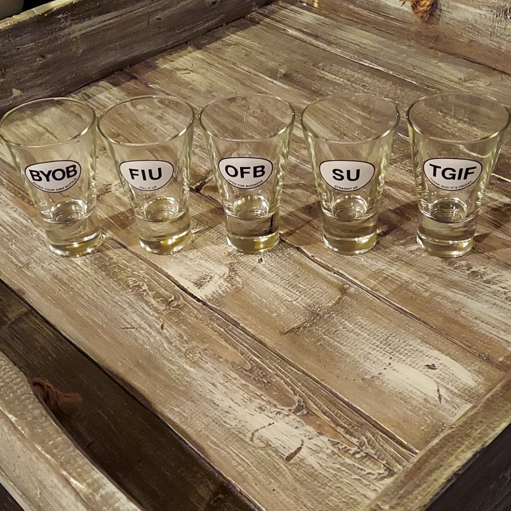 Cocktail glasses with funny acronyms